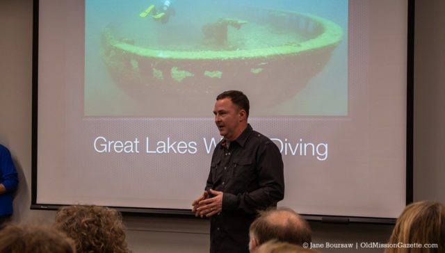 OMP Photo Roundup: Happy Kids, Santa, Cider Pressing & More 8 Diver Chris Roxburgh presents a program on Great Lakes Shipwrecks at Peninsula Community Library on the Old Mission Peninsula | Jane Boursaw Photo